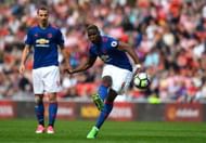 SUNDERLAND, ENGLAND - APRIL 09: Paul Pogba of Manchester United takes a free kick watched by Zlatan Ibrahimovic of Manchester United during the Premier League match between Sunderland and Manchester United at Stadium of Light on April 9, 2017 in Sunderland, England.  (Photo by Stu Forster/Getty Images)